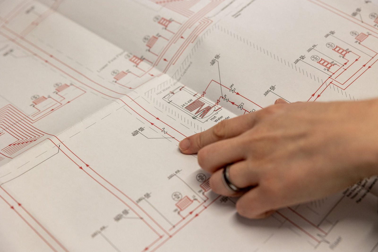 Engineering team reviewing building plans